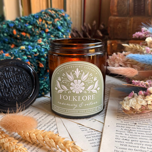 Folklore bookish candle. Rosemary and vetiver.