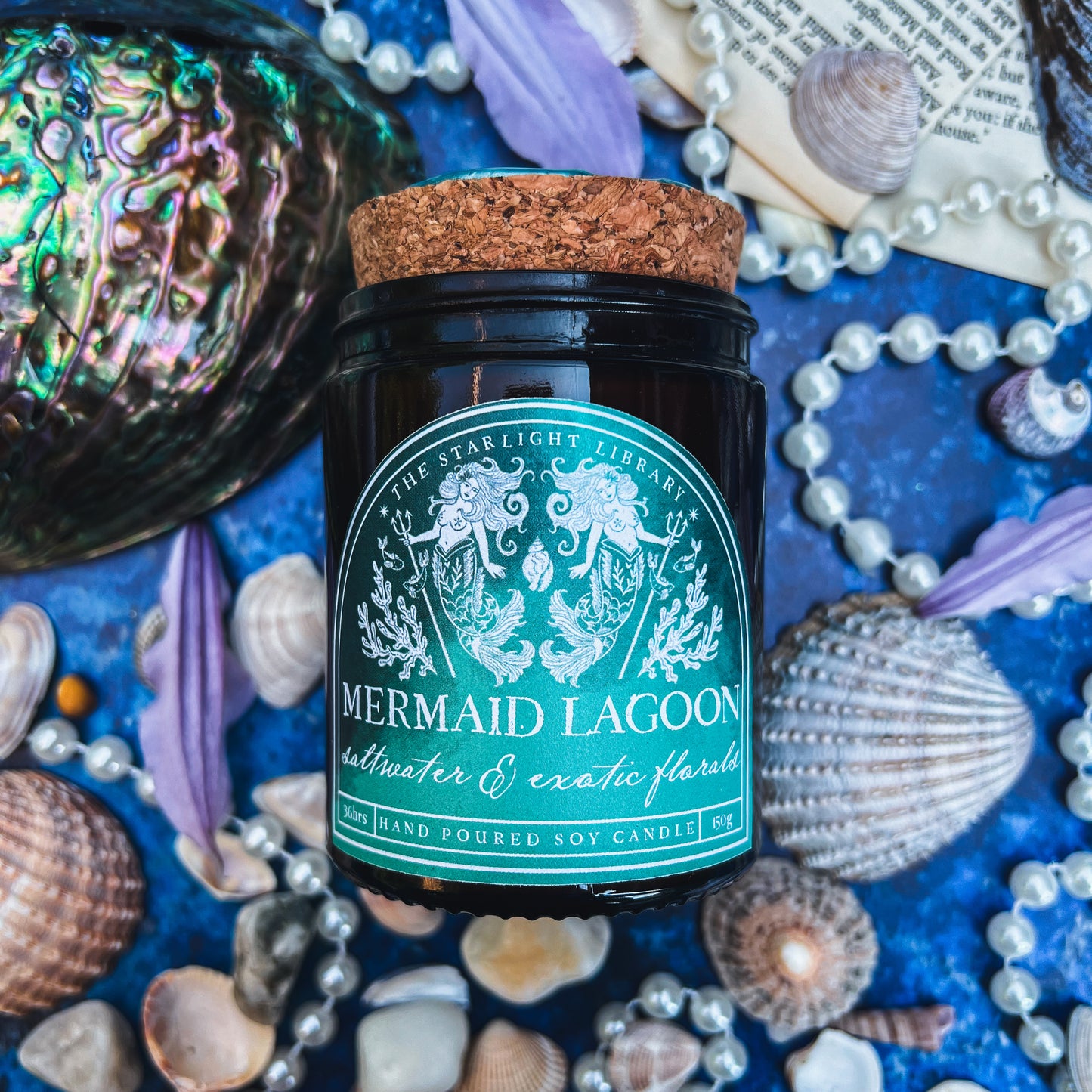 Mermaid Lagoon Candle. Saltwater & Exotic florals.